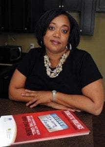 Charmagne Helton, a parishioner at St. Brigid Church, Johns Creek, was a victim of domestic violence for years before she was able to get away from the man that physically abused her. Helton works closely with the Partnership Against Domestic Violence. Photo by Johnny Crawford, AJC