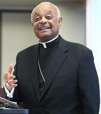 On the 10th anniversary of Archbishop Gregory’s arrival to Atlanta, he was working like any other day. He was caught flashing his trademark smile, a good sign after a decade on the job. Photo By Michael Alexander