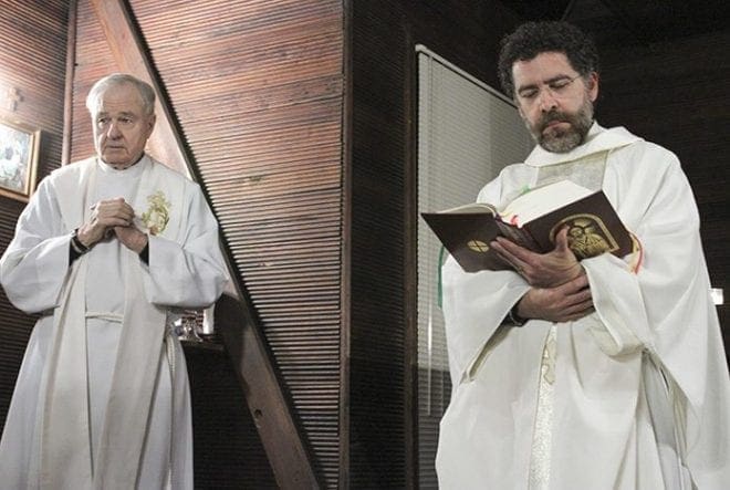 Father Rafael Carballo, right, the current pastor of Our Lady of Perpetual Help Church, stands with the first pastor of the parish, Father Richard Morrow. Father Carballo was main celebrant for the Nov. 17 Mass marking the 50th anniversary of the Kennedy Chapel on the University of West Georgia campus. Father Morrow, who led the invocation at the program back in 1964, gave the homily on this particular night. Photo By Michael Alexander