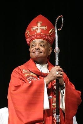 Archbishop Wilton D. Gregory enjoys the moment at the conclusion of a multicultural Mass celebrated at Our Lady of Mercy High School, Fayetteville, in February 2006. Photo By Michael Alexander