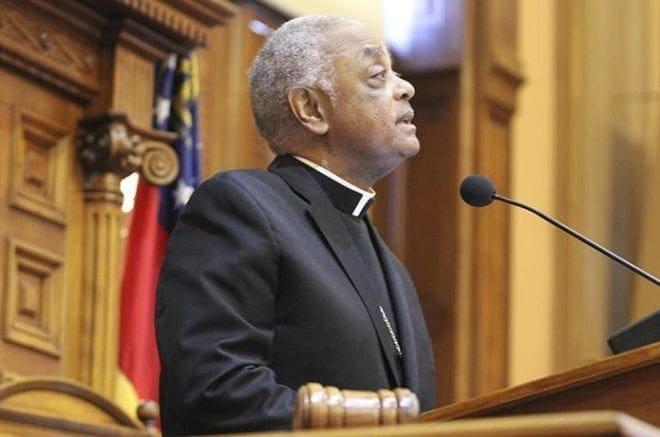 As part of Catholic Day, Archbishop Wilton D. Gregory leads the morning prayer on the House of Representatives' side of the Georgia Capitol, Feb. 3. Photo By Michael Alexander