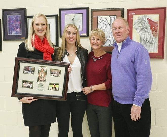 Brooke Alexander, far left, celebrates her Jan. 30 induction into the Blessed Trinity High School Athletic Hall of Fame with (l-r) her sister Jordan and her parents, Cindy and Dean. Photo By Michael Alexander