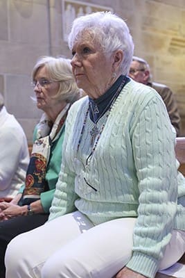 Pat Joyce, foreground, is seated beside her sister Maureen Beamer. Joyce’s birthday falls on the feast day of St. Patrick. She celebrated her 75th birthday by also attending the March 17 Mass with her husband Mike, her daughter Colleen and her brother and sister-in-law from Grosse Pointe, Mich., Mike and Sharon DeLong. Photo By Michael Alexander