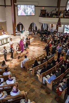 St. Ann Church, Marietta, hosted this year’s AACCW Recognition Day Mass, which was initiated in 1977 by the late AACCW past president Genevieve Jones-Geisling. The event was established to appreciate women and youth who give generously to serve others. During the Mass, Archbishop Wilton D. Gregory and the AACCW spiritual advisor, Father Bill Williams, distribute certificates, a prayer journal, and a pen to all of the honorees. Photo by Thomas Spink