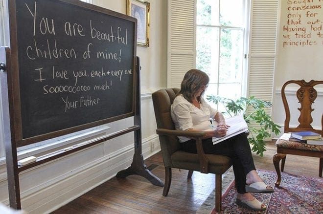 A resident works on a morning assignment. It involved writing a letter to someone else going through substance abuse or alcoholism, in an effort to give them hope and to share their personal experiences of fighting off addiction and undergoing recovery. Photo By Michael Alexander