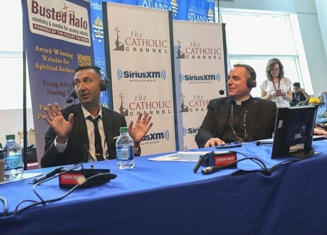Father Dave Dwyer, right, interviews Lino Rulli, host of “The Catholic Guy” on SiriusXM Satellite Radio. Photo By Michael Alexander