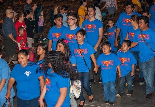 A large group of parishioners from St. John the Evangelist Church, Hapeville, came to the Eucharistic Congress wearing their “Super Jesus” T-shirts. During the procession, they sang and clapped, engaging the crowd with enthusiasm. Photo By Thomas Spink