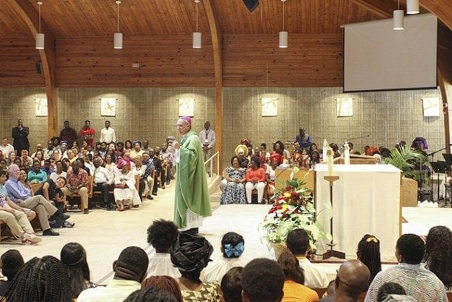 Bishop Luis Zarama was the main celebrant and homilist for the rededication Mass at St. Thomas the Apostle Church in Smyrna. The church sanctuary was renovated with new interior entrance doors, flooring, LED lighting, pews, projection screens, sound system and a refurbished wall was installed behind the altar. Photo By Michael Alexander