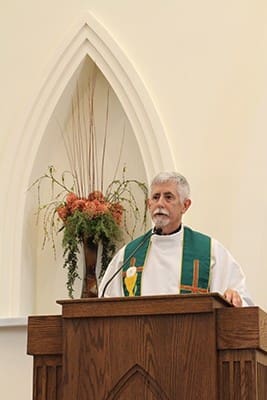 Father Daniel Toof, the pastor of St. Anna Church, Monroe, expresses his gratitude to all who made the building of the new Walton County church possible. He has been the pastor at St. Anna for 14 years. Photo By Michael Alexander