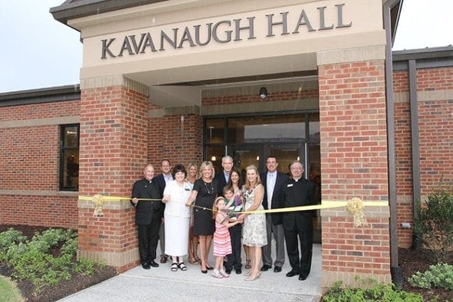 (L-r) Father John Harhager, president of Marist School, Atlanta, Joe George, Notre Dame Academy chairman of the board of trustees, Dr. Diane Starkovich, superintendent of Catholic schools, Kelly George, wife of Joe, Debra Orr, Notre Dame Academy head of school, benefactors Patrick and Brenda Kavanaugh, their children Philip and Veronica, City of Duluth Mayor Nancy Harris, Brian Marks, Notre Dame Academy High School principal, and Father Joel Konzen, principal of Marist School, gather for the Aug. 17 ceremonial ribbon-cutting on behalf of the inaugural school year of the Notre Dame Academy High School freshman class. Photo By Michael Alexander