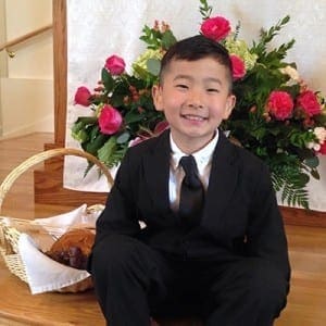 Alex Mullican, a third-grade student at the Georgia School for the Deaf, celebrated his first holy Communion in May 2015 at St. Gerard Majella Church in Fort Oglethorpe. The archdiocese's Office of Deaf Services assisted the family throughout the preparation process.