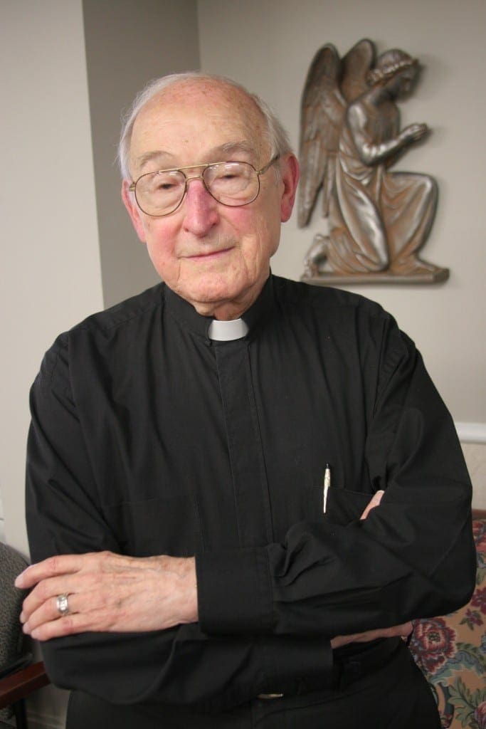 Angels were looking over many of the Hurricane Katrina survivors like Father Royce Mitchell. (Page 3, August 24, 2006 issue)