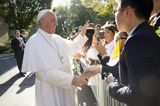 Pope Francis greets people outside the Vatican Embassy before leaving for the White House in Washington Sept. 23. CNS photo/Jaclyn Lippelmann, Catholic Standard