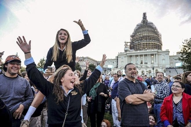 Crowds gather on the west side of the U.S. Capitol to catch a glimpse of Pope Francis as he prepared to address a joint meeting of Congress in Washington Sept. 24. CNS photo/Mary F. Calvert, Reuters