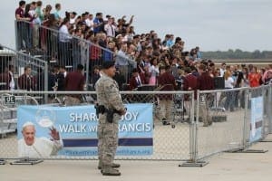 People await the arrival of Pope Francis on the airfield at Joint Base Andrews in Maryland Sept. 22. 