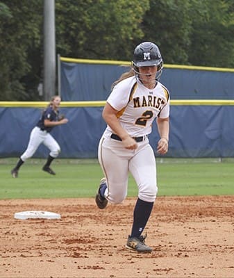 Marist pitcher Kylie Burke (#2) had three doubles and batted in five runs to go with her 13 strikeouts. Burke held regional rival, St. Pius X, to six hits, thus securing a 9-2 win in the Sept. 22 game. Photo By Michael Alexander