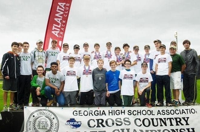 The Blessed Trinity High School boys cross-country team and coaches pose for a post meet photograph after capturing the state championship at Carrollton High School Nov. 7. 