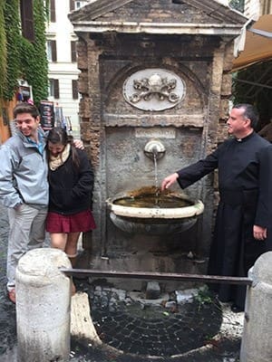 (L-r) Gino Vizzi, his sister Julia and Father Eric Hill, pastor of Prince of Peace Church, Flowery Branch, do some sightseeing around Rome. Father Hill and the Vizzi family left for Italy Oct. 18 and returned to the United States Oct. 23. The trip was meant to fulfill Gino’s wish of meeting Pope Francis. Photo Courtesy of the P4Foundation