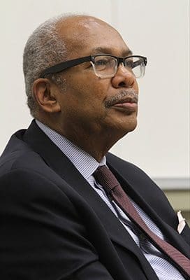 Ernest Green, one of nine African-American students to enroll in ArkansasÕ racially segregated Little Rock Central High School in 1957, entertains questions from Marist School students during a Jan. 15 class in the Ivy Street Center lecture hall. Photo By Michael Alexander