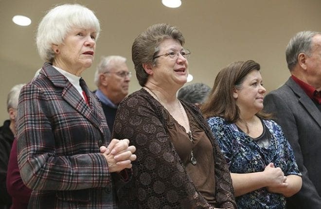 (L-r) Eleanor Johnson, Helen Jirka and Julie Bugg were among the hundreds of parishioners who came together not only for the rededication of the renovated sanctuary but the 40th anniversary of the parish and the 10th anniversary of the church’s presence in Flowery Branch. Photo By Michael Alexander