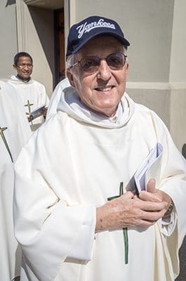 Father Rene Robert, with hat, is pictured during a 2015 procession for Mass at the Cathedral Basilica of St. Augustine in Florida. The 71-year-old priest was found dead April 18 in Burke County, Ga., after being reported missing April 12 when he did not show up for a church function. CNS photo/Woody Huband, Diocese of St. Augustine