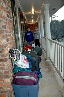 Alex Matullo, left, and Joseph Miller collected totes, backpacks and luggage from their neighborhood to help youngsters in foster care as part of the Totes2Tots luggage drive.