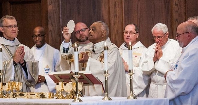 Archbishop Wilton D. Gregory, center, was the main celebrant for the 39th annual Recognition Day Mass, sponsored by the Atlanta Archdiocesan Council of Catholic Women. The Mass this year was celebrated at St. Brigid Church, Johns Creek, and concelebrated by priests of the archdiocese April 16. Photo by Thomas Spink