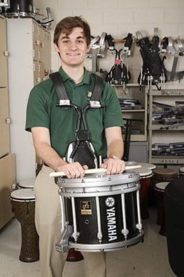 In addition to his many hours of community service and involvement in the robotics club, Blessed Trinity High School senior Luke Donovan was a member of the drumline and played saxophone in the symphonic band. Photo By Michael Alexander