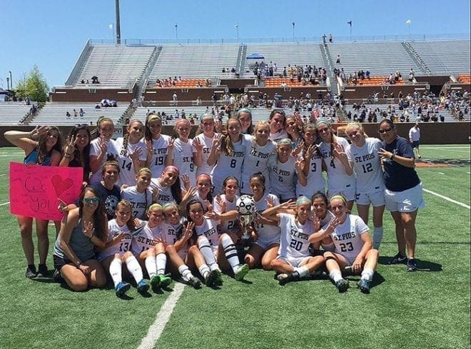 The St. Pius X High School girls soccer team won its fourth straight state soccer title after a 2-0 victory over Marist School. Head coach Sara Schmitt, lower tier, kneeling, second from left, has guided the team to seven championships in the last eight years.