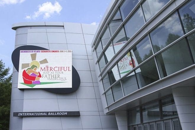 The 2016 Eucharistic Congress theme appears on the marquee at the Georgia International Convention Center, College Park, June 3, the evening of the opening Mass and healing service. Photo By Michael Alexander