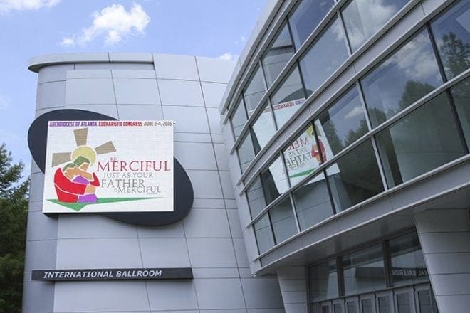 The 2016 Eucharistic Congress theme appears on the marquee at the Georgia International Convention Center, College Park, June 3, the evening of the opening Mass and healing service. Photo By Michael Alexander