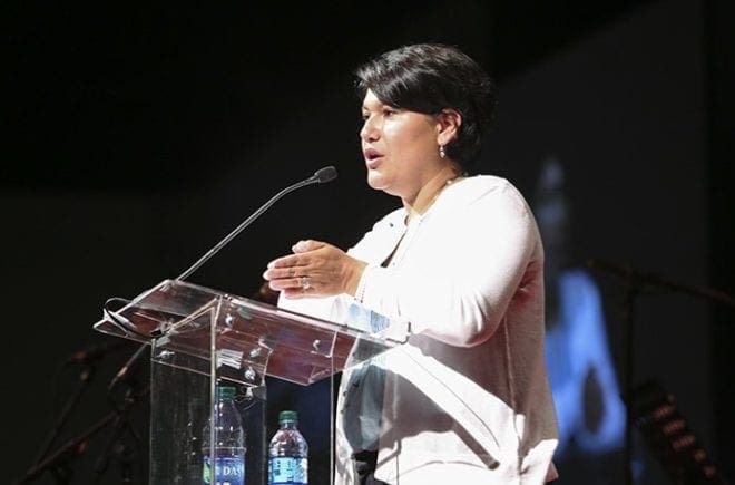 Ramona Treviño, a former Planned Parenthood employee, who now serves as a spokeswoman for 40 Days for Life in Dallas, speaks to a large audience during an afternoon session in the Spanish track. Photo By Michael Alexander