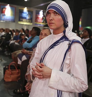 Missionaries of Charity Sister Faustina Maria directs her gaze toward the Blessed Sacrament during the June 3 Eucharistic Congress healing service. Photo By Michael Alexander