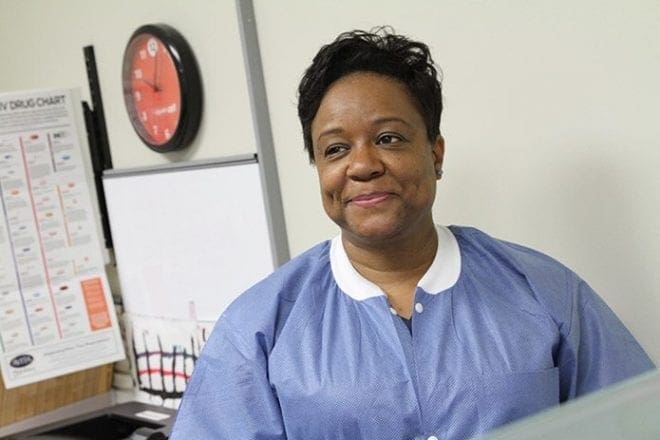 Dr. Katrina Schuler-Bacon, a native of Flint, Mich., and a graduate of Meharry School of Dentistry, Nashville, Tenn., had her own private practice for a number of years before coming to work at Mercy Care a year ago. The clinic can see up to 12-14 patients a day. Photo by Michael Alexander