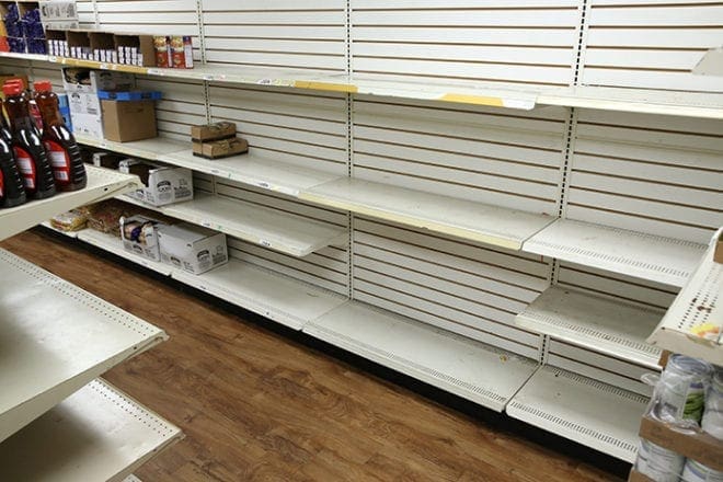 Items available at the St. Vincent de Paul Lakewood food pantry are limited in quantity and some foods are completely gone. Photo By Michael Alexander