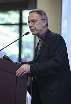 Bishop Luis Zarama conveys his morning message to the audience on hand for the Aug. 6 Encounter of Hispanic Ministries at the Archdiocese of Atlanta Chancery in Smyrna. Photo By Michael Alexander