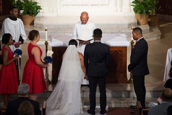 Wesley Yates, right center, and his new bride, Bianca, were married on June 25, just days after his return to Atlanta following the PGA Tour China. His grandfather, retired Deacon Fred Sambrone, top step, center, the man credited with teaching Yates the game of golf, officiated at the ceremony. Photo By Tristan Ervin
