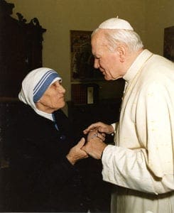 St. John Paul II meets Blessed Teresa of Kolkata at the Vatican in this undated photo. CNS photo/L'Osservatore Romano