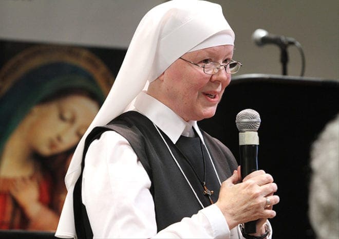 Eudist Servants of the Eleventh Hour Sister Mary Francis addresses AACCW convention-goers about forgiveness, mercy and prayer during the afternoon spirituality workshop. Photo By Michael Alexander