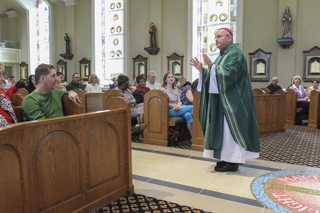 Bishop David Talley is the main celebrant and homilist at the 2013 Faith and Sharing Mass at St. Benedict Church, Johns Creek. Photo By Michael Alexander