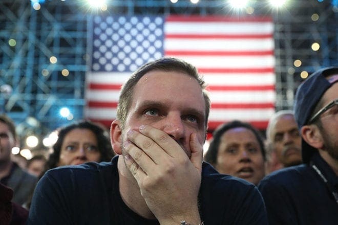People react to election results at the Jacob K. Javits Convention Center in New York City Nov. 8. CNS Photo/Andrew Gombert, EPA