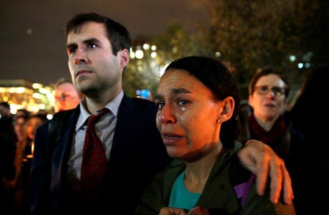 A woman cries while taking part in an anti-Trump vigil in front of the White House in Washington Nov. 9. CNS Photo/Kevin Lamarque, Reuters