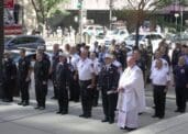 New York Cardinal Timothy M. Dolan stands with New York City Fire Department firefighters outside St. Patrick's Cathedral in New York City Sept. 11, 2021, on the 20th anniversary of 9/11.